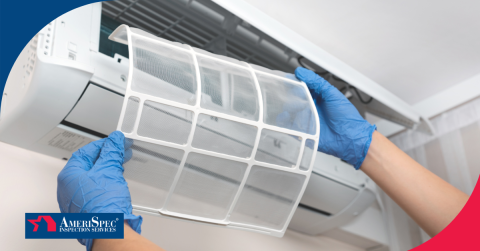 Hands removing mini split AC filter